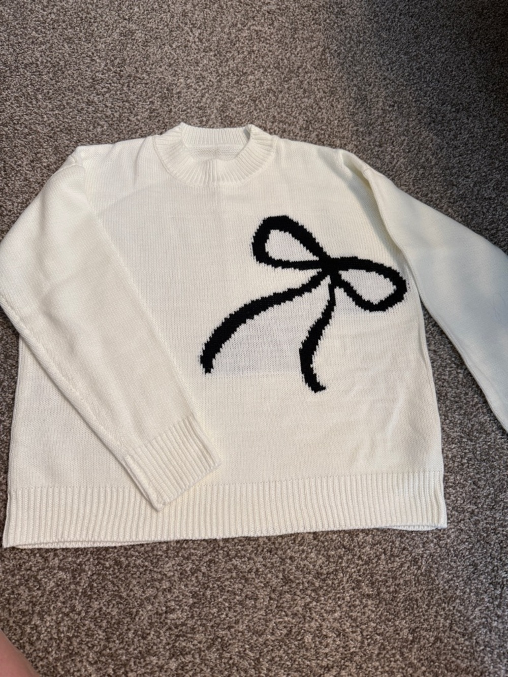 Classic Cream Sweater with Black Bow Accent